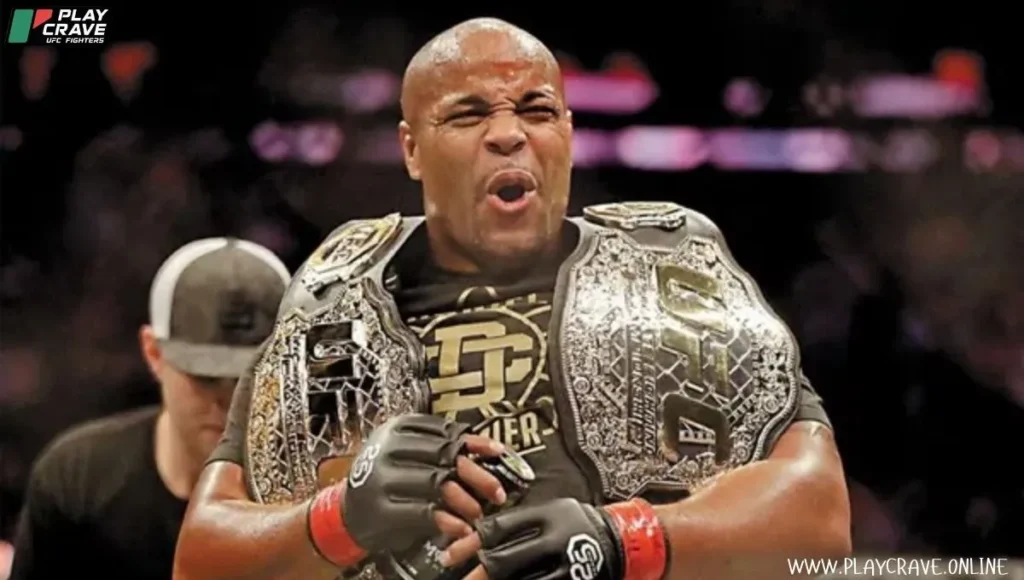 A heavyweight MMA fighter holding two UFC belts