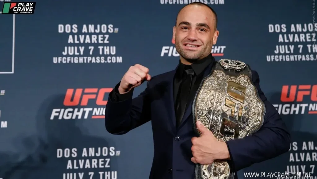 An MMA fighter holding a UFC belt 