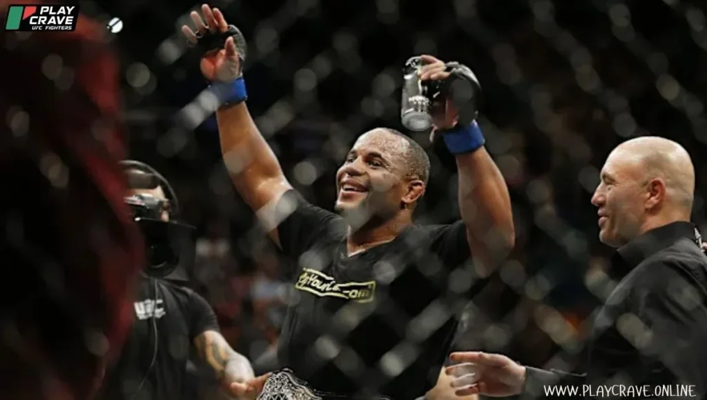 A heavyweight MMA fighter raising his hands after winning the UFC fight