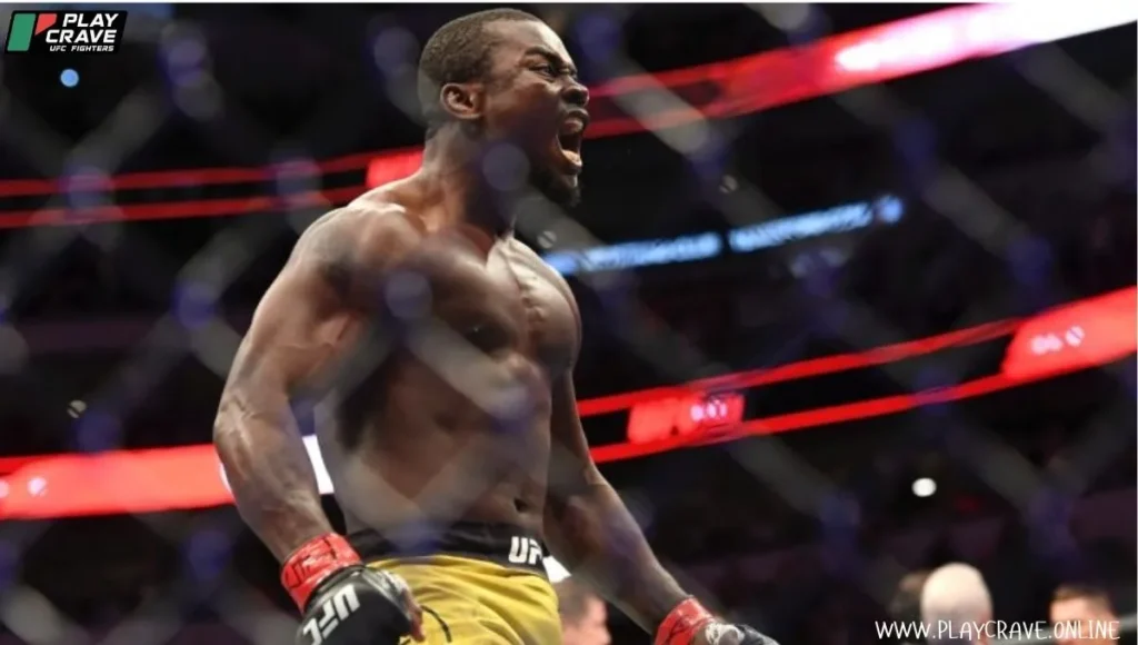 A fighter in the UFC octagon with UFC gloves