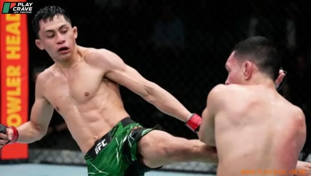 Victor throwing a knockout kick on the opponent in the cage