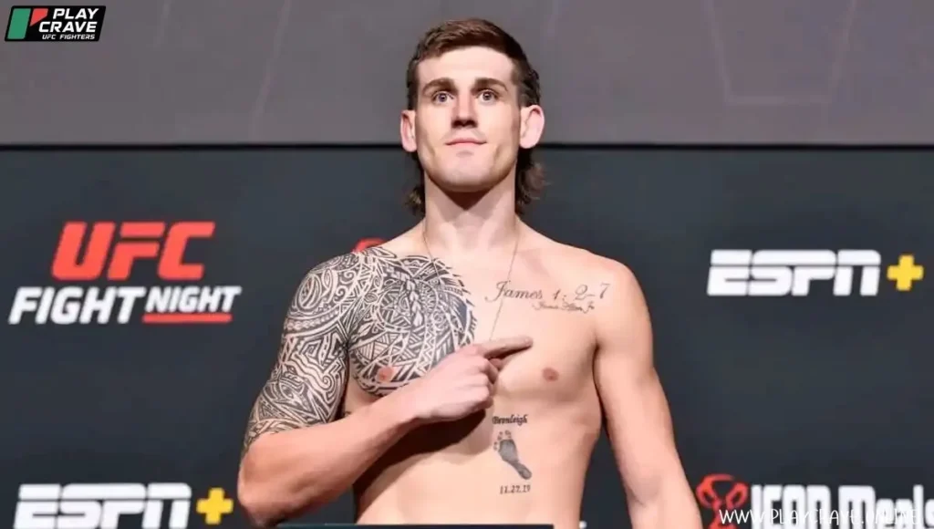 An MMA fighter checking his weight before the fight