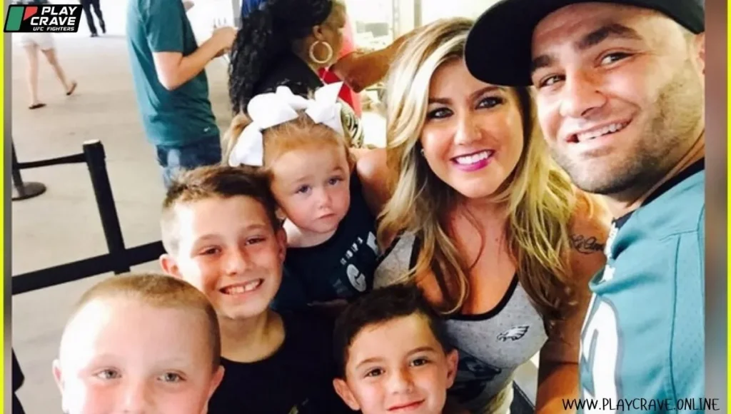 A group photo of Eddie Alvarez with his family