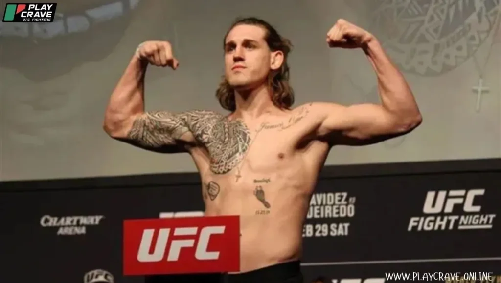 An MMA fighter standing on the UFC weigh-in 